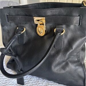Michael Kors Black Leather Satchel with Gold Lock Accent